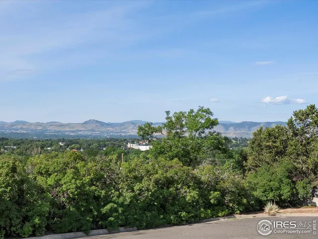 a view of a mountain with a outdoor space