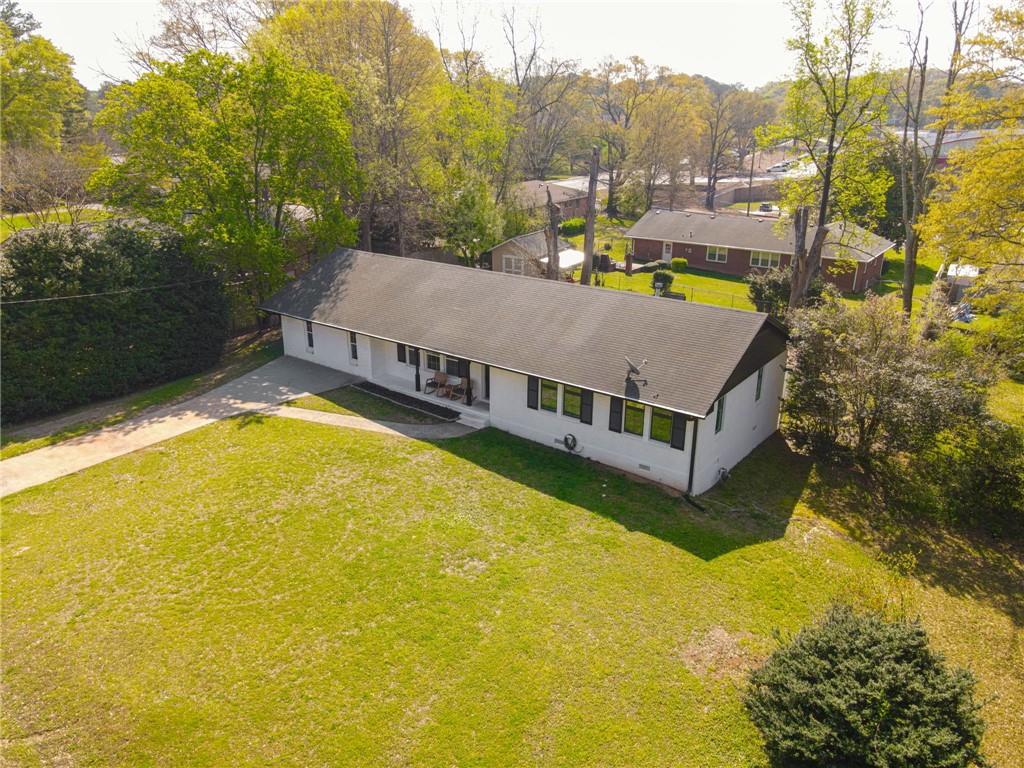 150 Sims Street Winder, GA 30680 - Photo 48 of 61 a view of a house with a swimming pool