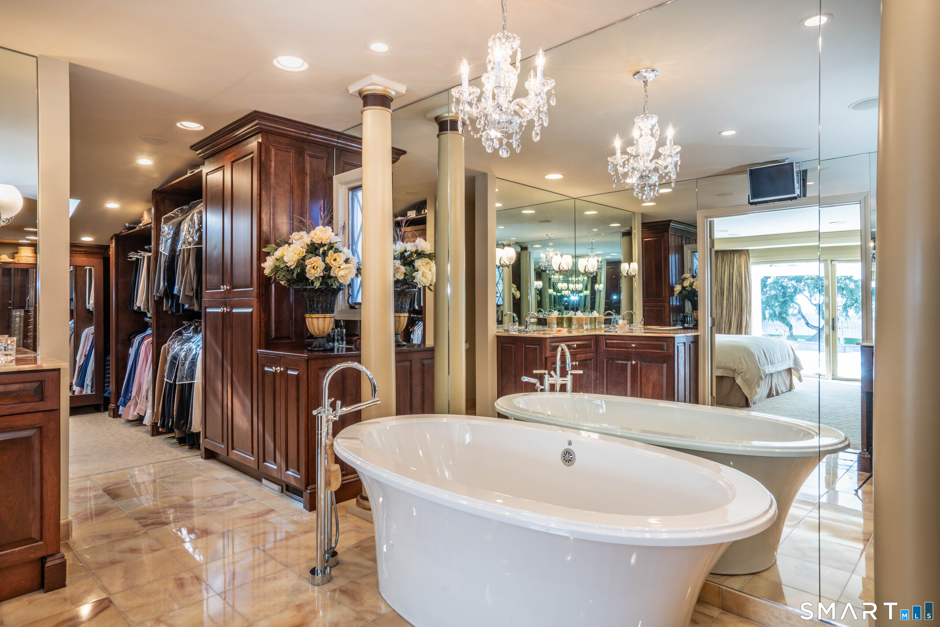 33 Mountain Farms Road West Hartford, CT 06117 - Photo 15 of 38 a large tub sitting in a room with a chandelier