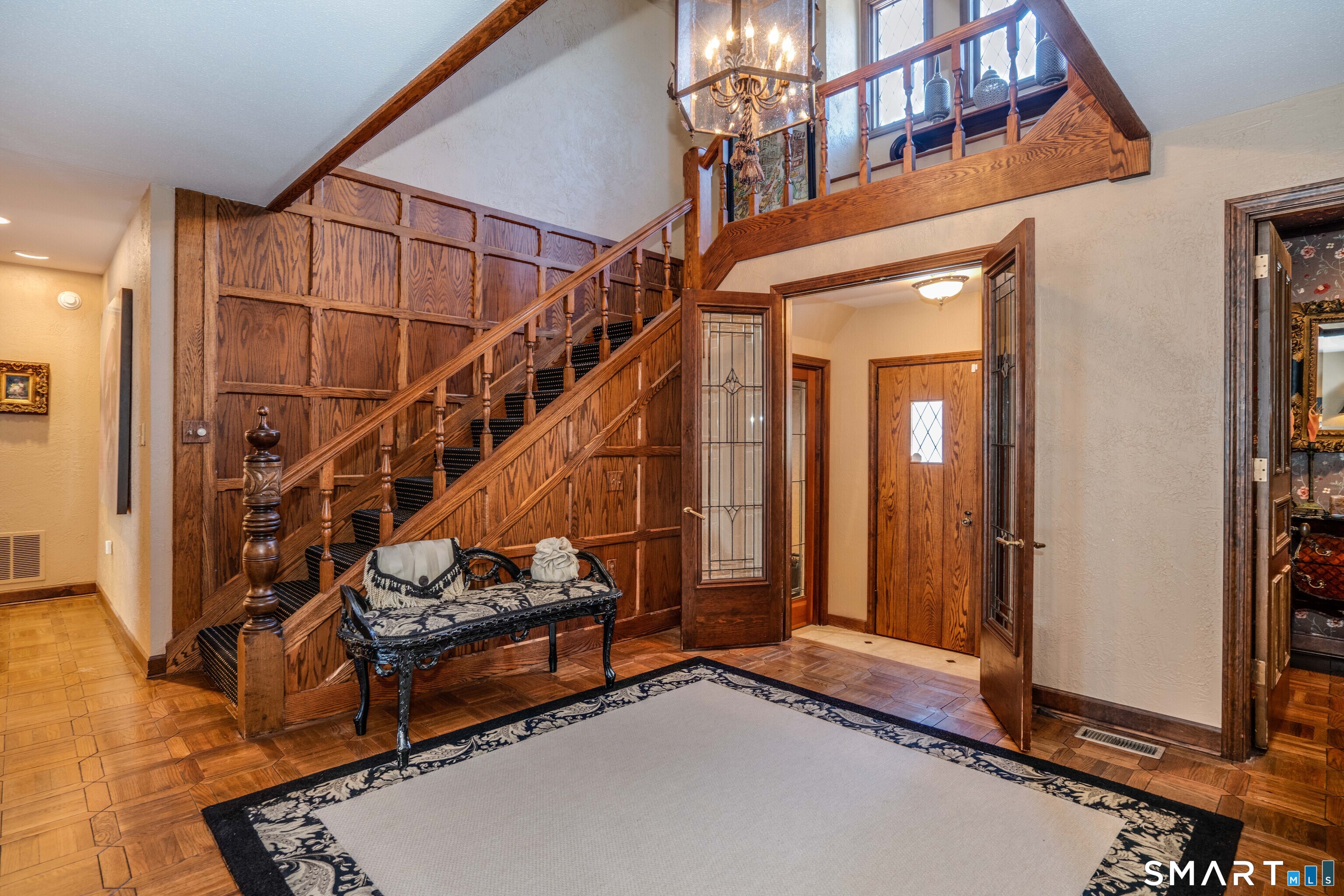 33 Mountain Farms Road West Hartford, CT 06117 - Photo 2 of 38 a view of staircase with white walls and windows