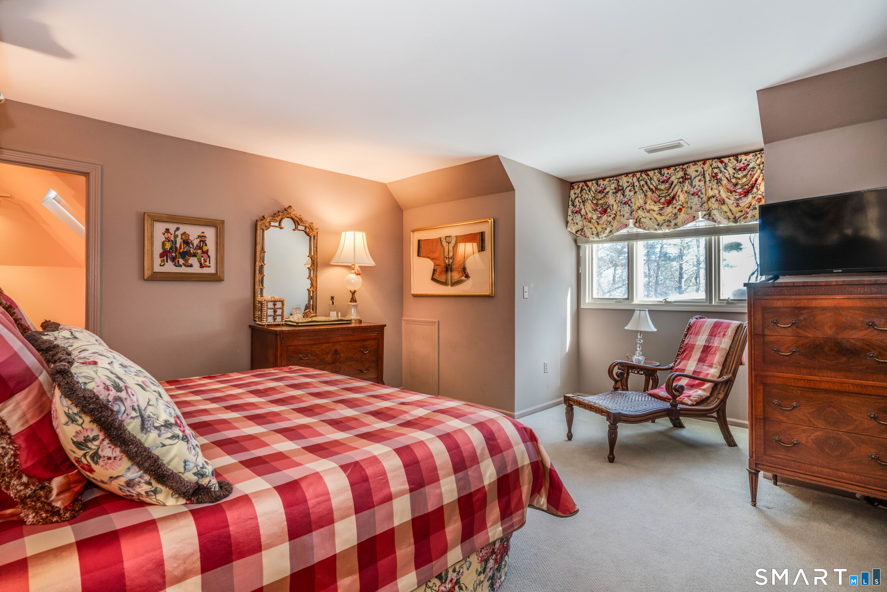 33 Mountain Farms Road West Hartford, CT 06117 - Photo 24 of 38 a bedroom with a bed and wooden floor