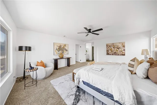 a bedroom with a bed and furniture