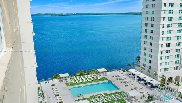 view of a terrace with a table and chairs