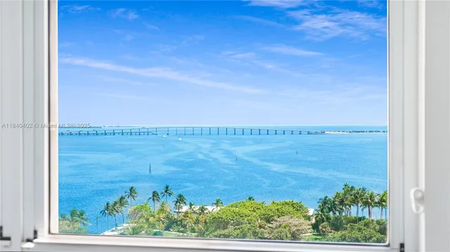 a view of a lake from a balcony