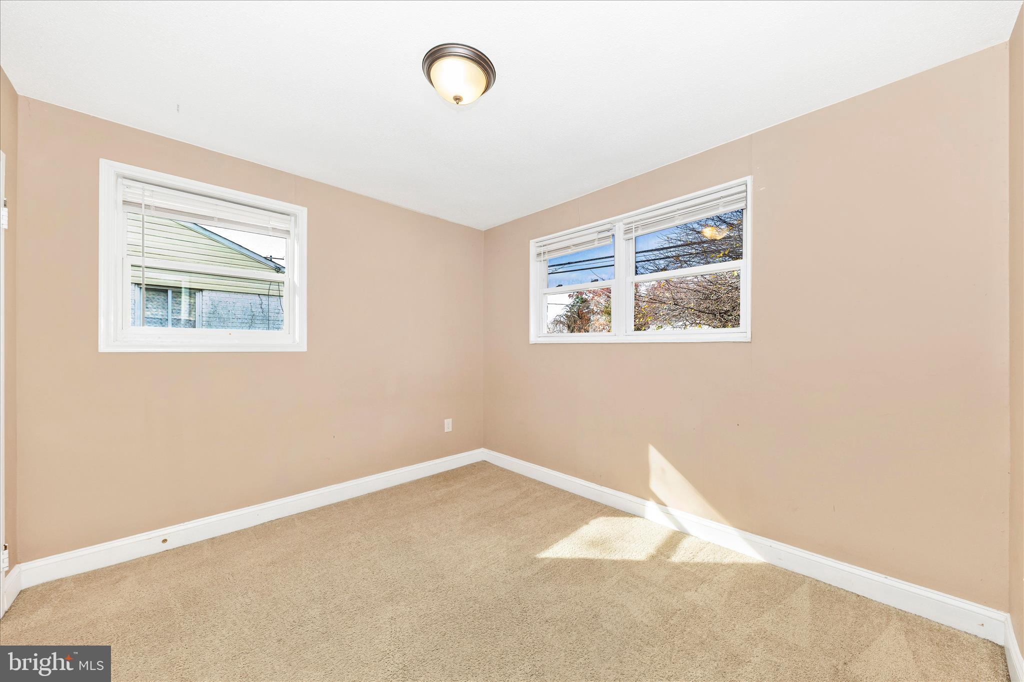 8109 Riggs Road Hyattsville, MD 20783 - Photo 13 of 54 a view of a room with windows