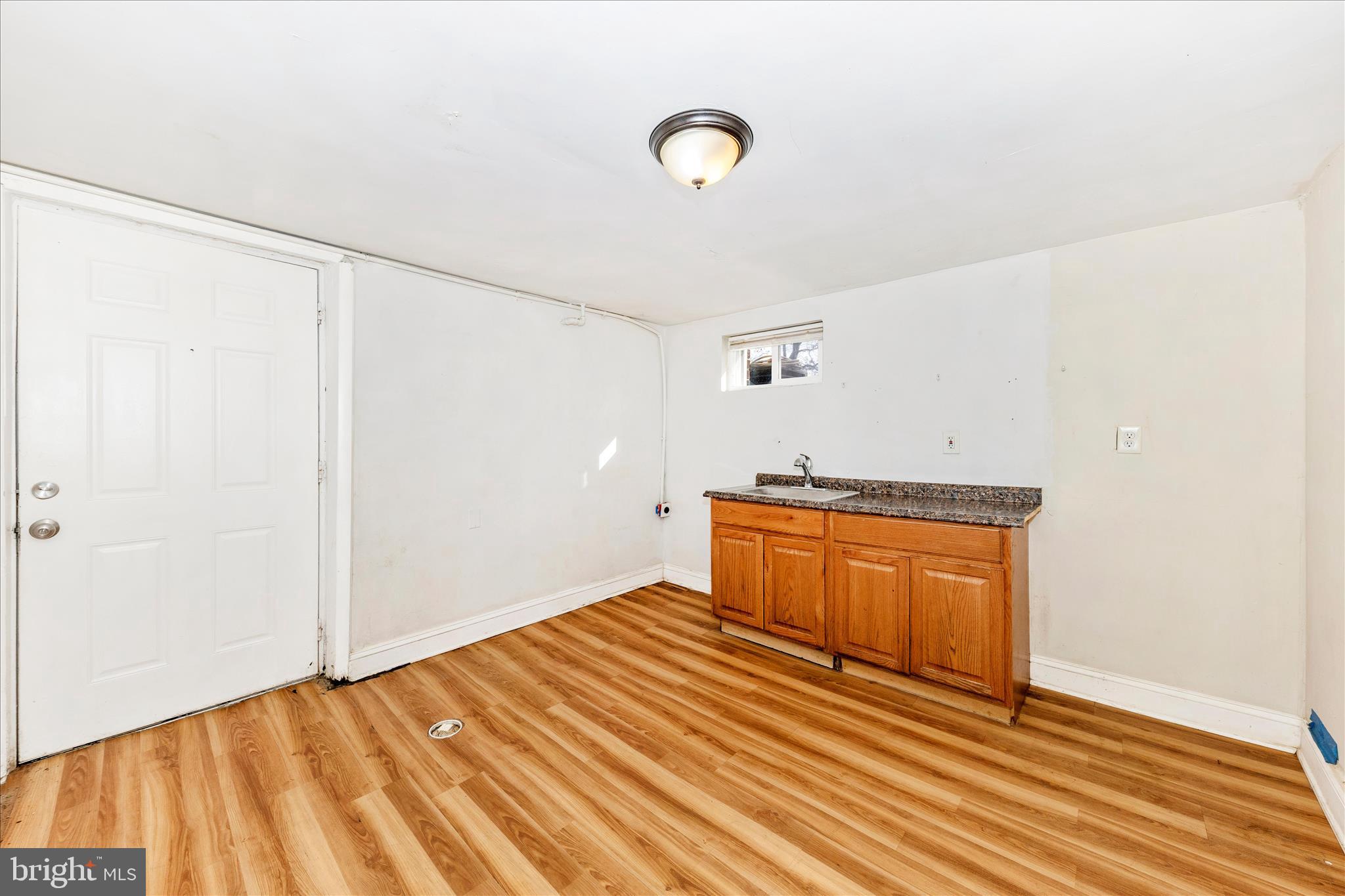 8109 Riggs Road Hyattsville, MD 20783 - Photo 33 of 54 a view of a room with wooden floor