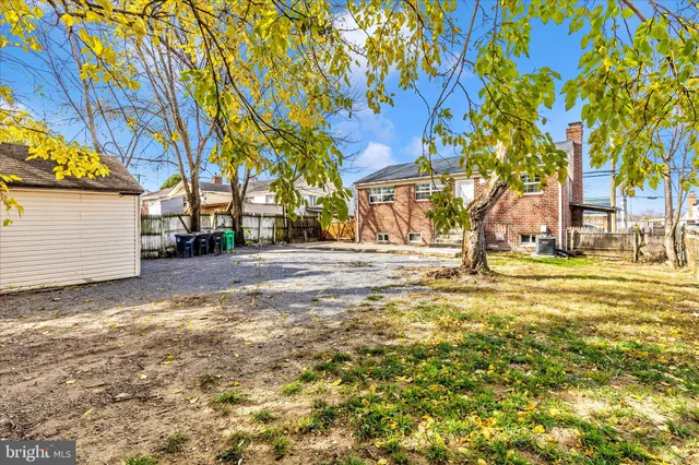 a view of a house with a snow in the yard