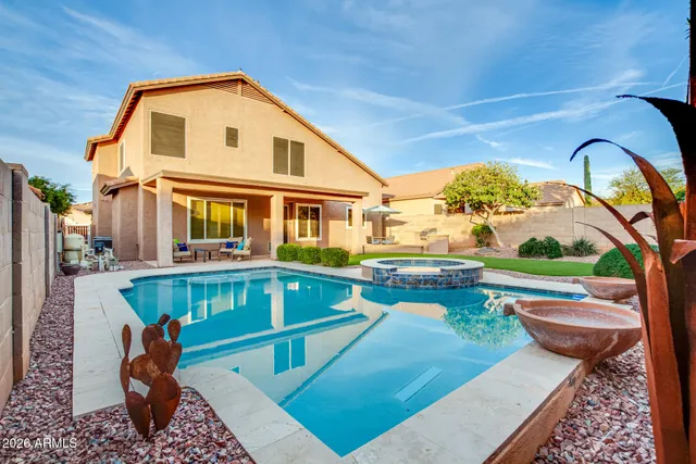 a front view of house with outdoor space