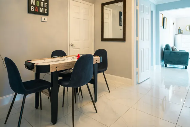 a bedroom with a bed and dresser