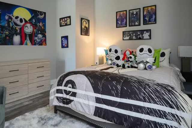 a kitchen with stainless steel appliances granite countertop a refrigerator and a stove