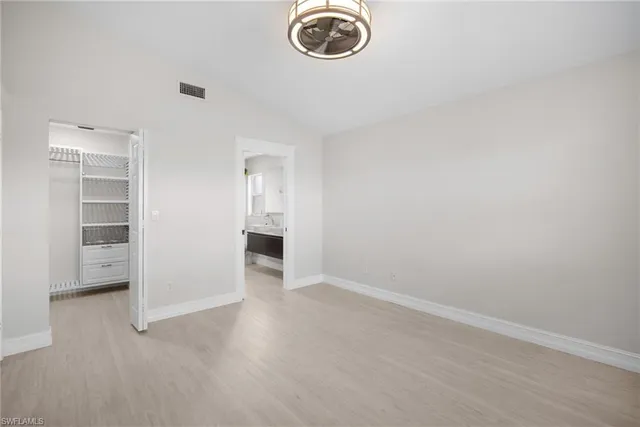 a bathroom with a bathtub and a sink