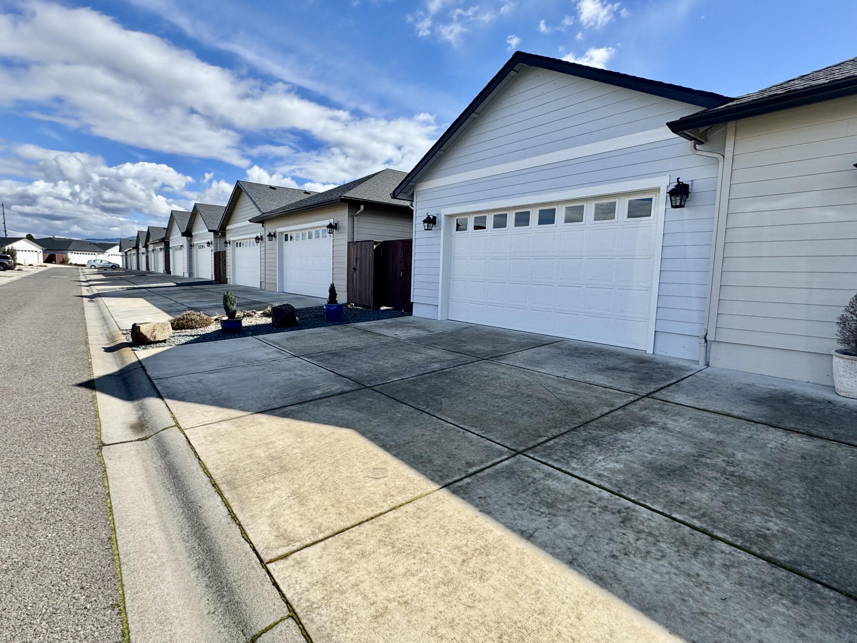 438 Cheney Loop Central Point, OR 97502 - Photo 15 of 15 Paved private street security access to double garage