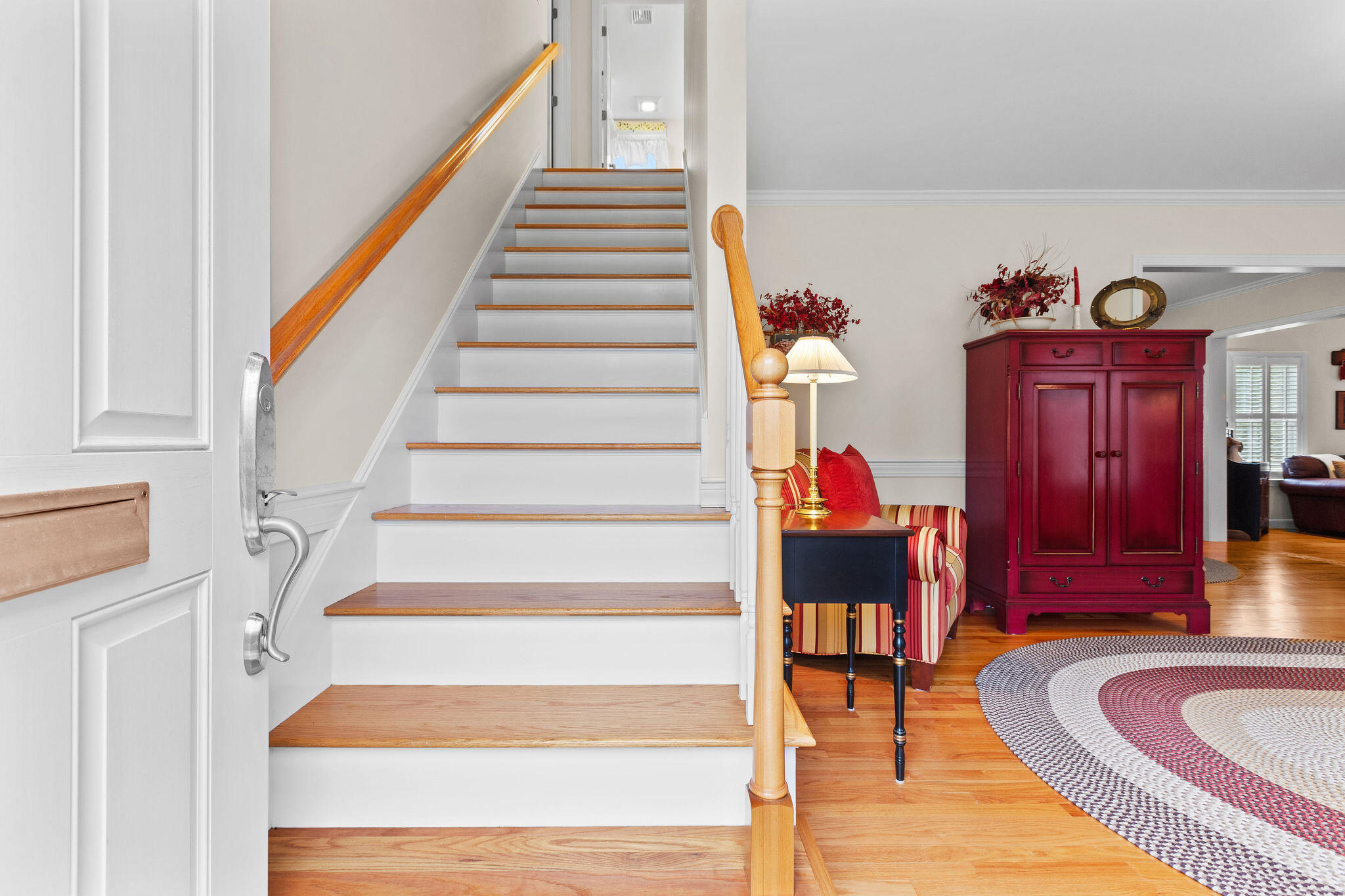 154 Beechtree Drive Brewster, MA 02631 - Photo 29 of 76 a view of entryway and hall with wooden floor