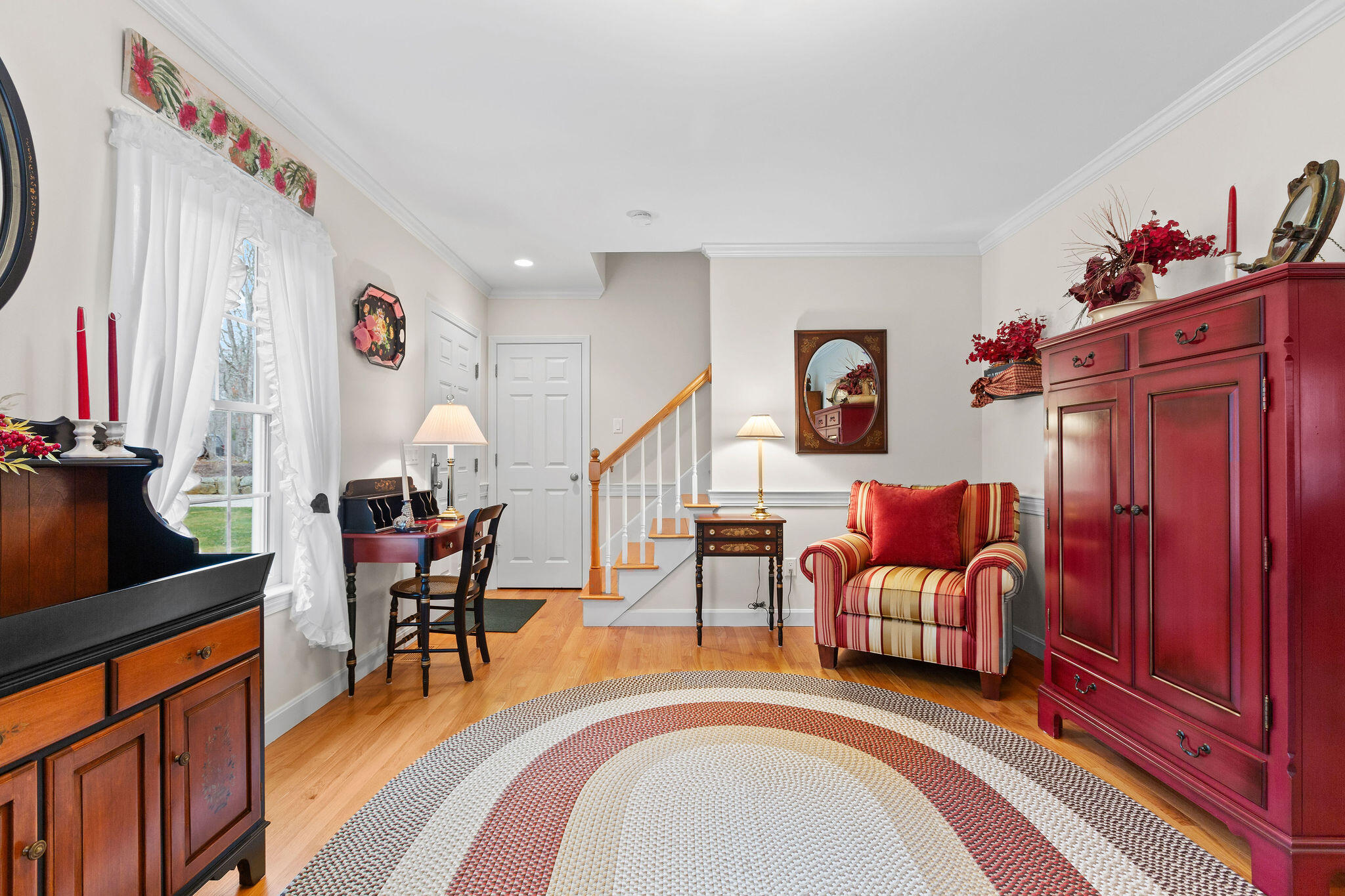 154 Beechtree Drive Brewster, MA 02631 - Photo 32 of 76 a living room with furniture and a flat screen tv