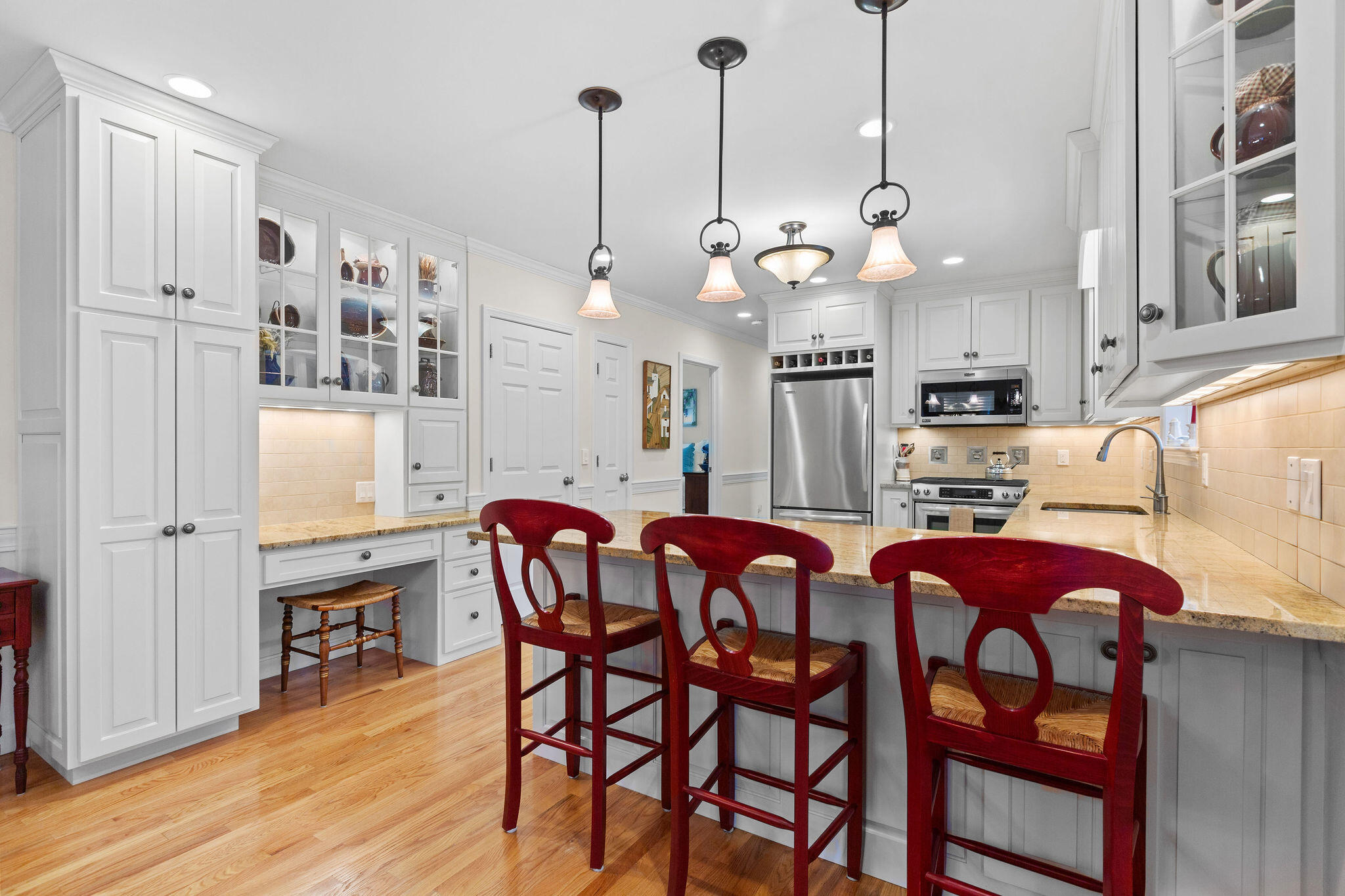 154 Beechtree Drive Brewster, MA 02631 - Photo 36 of 76 a view of a dining room with furniture and wooden floor