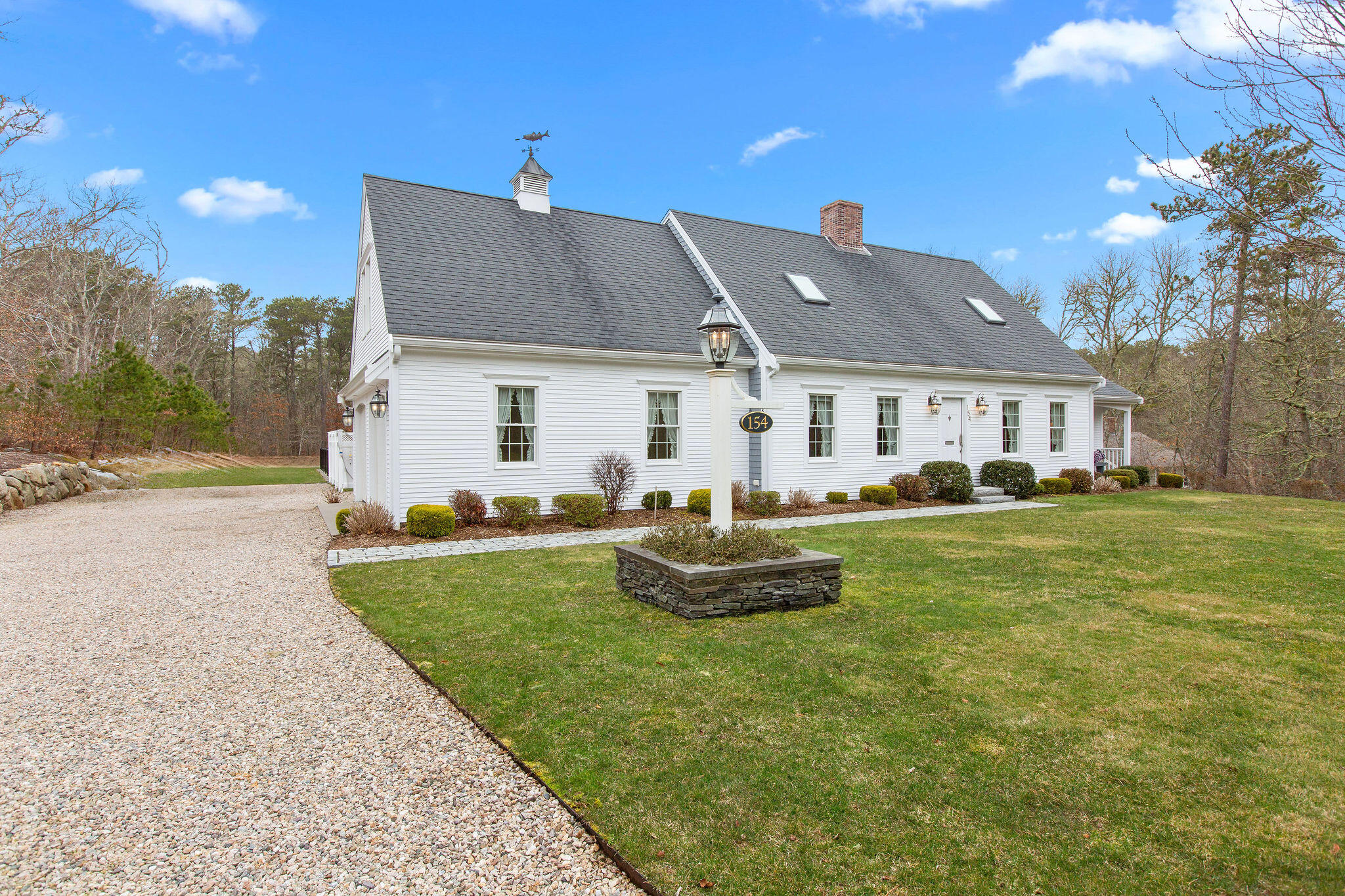 154 Beechtree Drive Brewster, MA 02631 - Photo 4 of 76 a front view of house with yard and green space