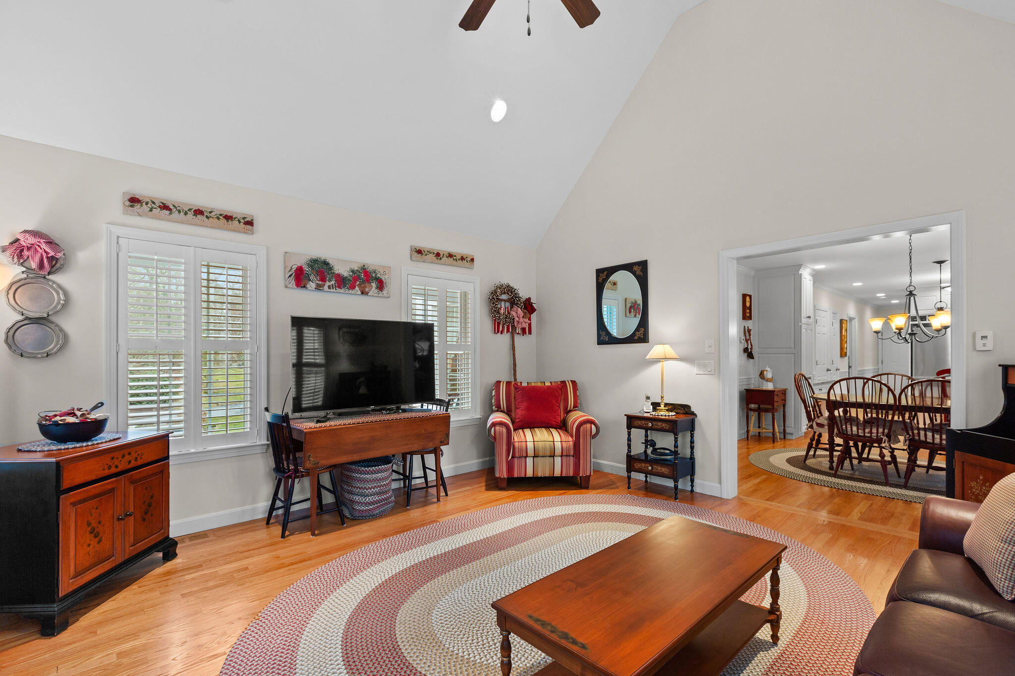 154 Beechtree Drive Brewster, MA 02631 - Photo 44 of 76 a living room with furniture and a flat screen tv