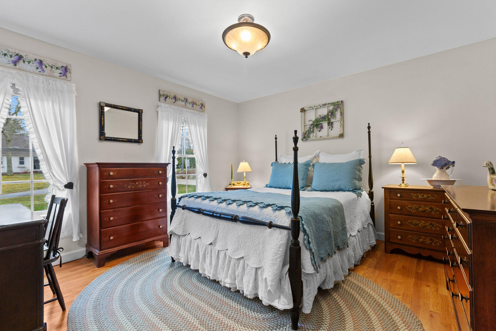 154 Beechtree Drive Brewster, MA 02631 - Photo 45 of 76 a bedroom with a bed and furniture