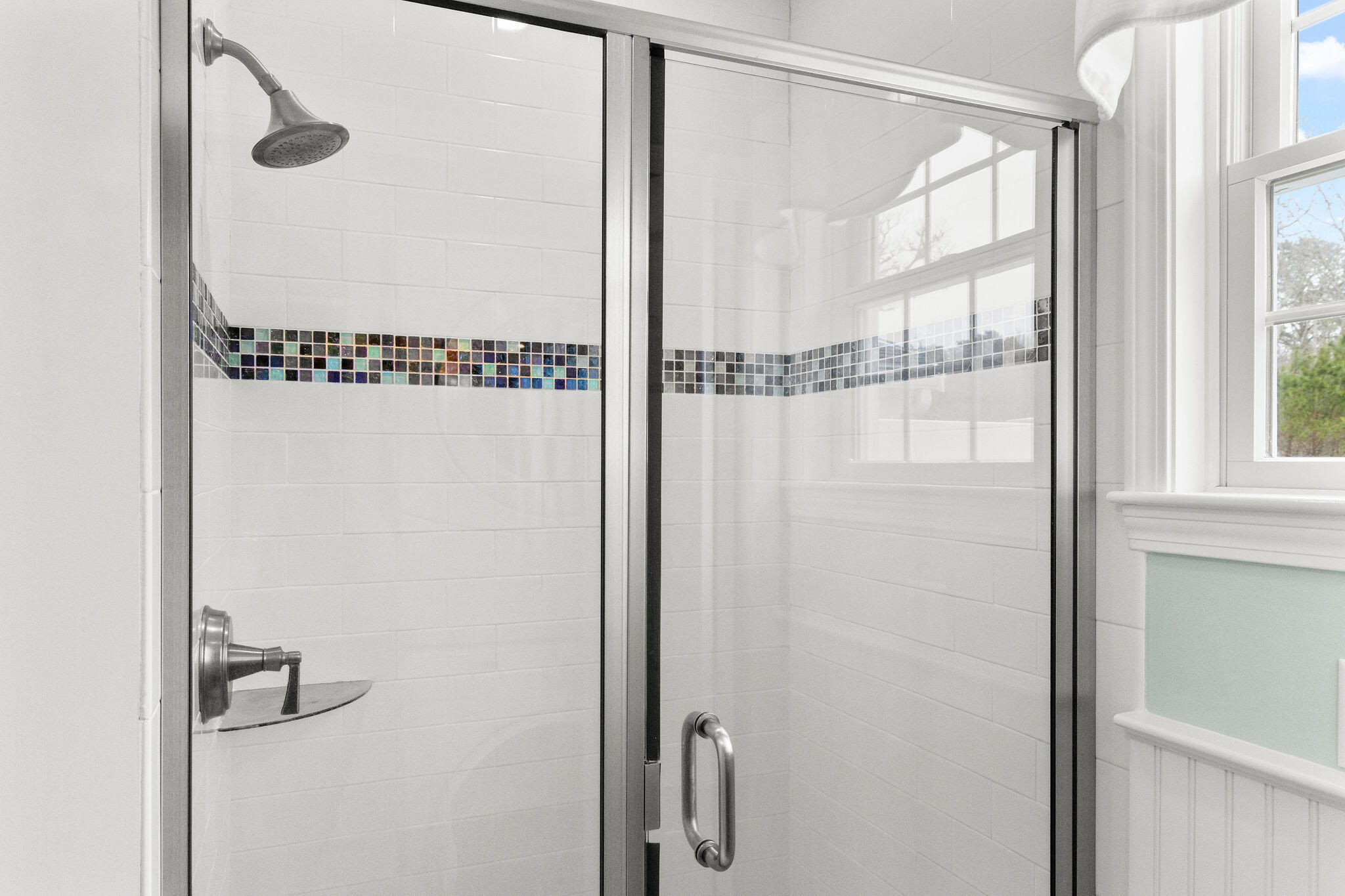 154 Beechtree Drive Brewster, MA 02631 - Photo 49 of 76 a bathroom with a glass shower door