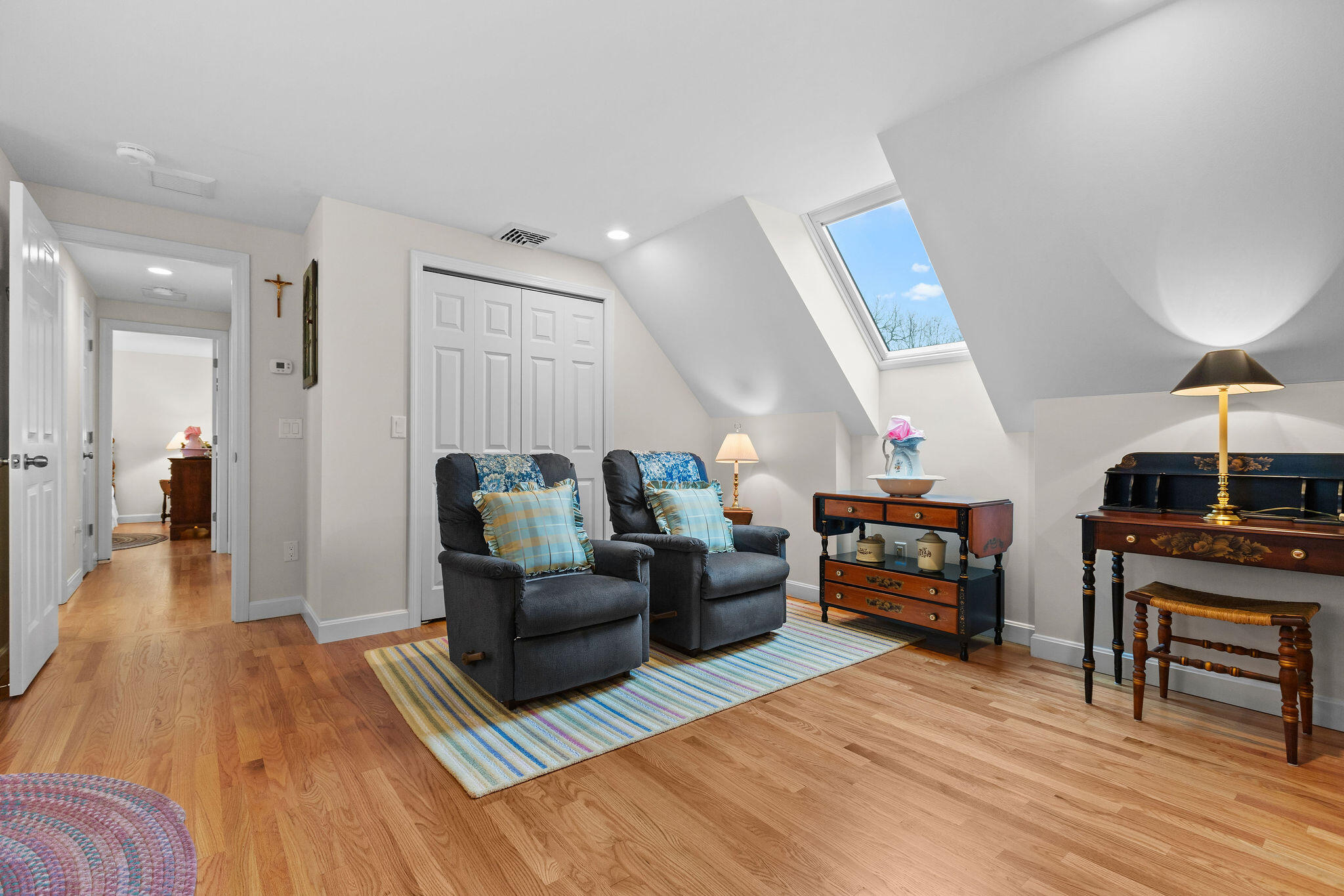 154 Beechtree Drive Brewster, MA 02631 - Photo 59 of 76 a living room with furniture and a wooden floor