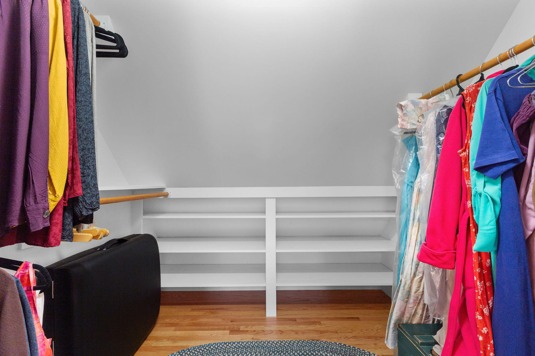 154 Beechtree Drive Brewster, MA 02631 - Photo 60 of 76 a view of walk in closet with clothes and shoes