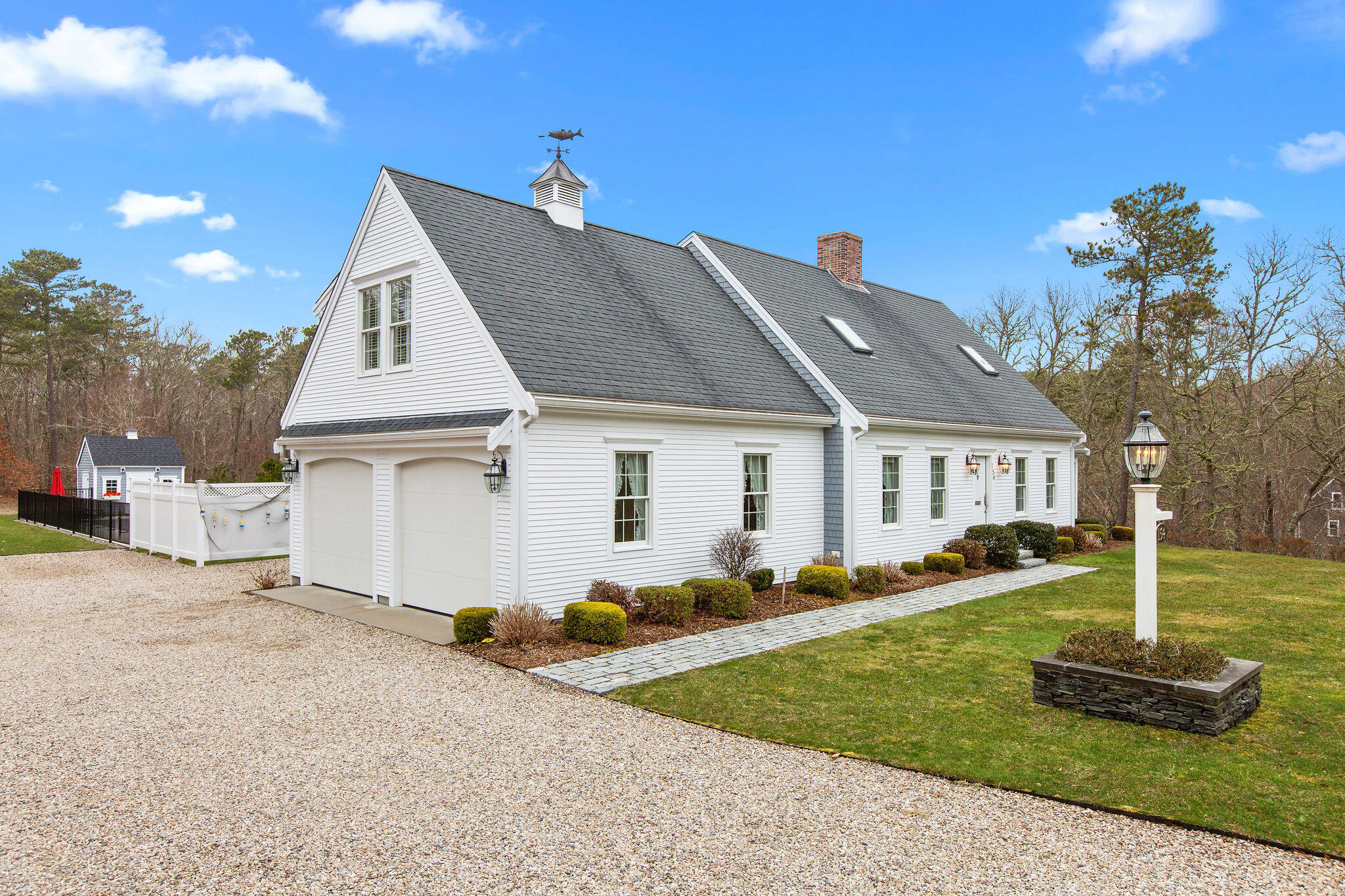 154 Beechtree Drive Brewster, MA 02631 - Photo 6 of 76 a front view of a house with a yard