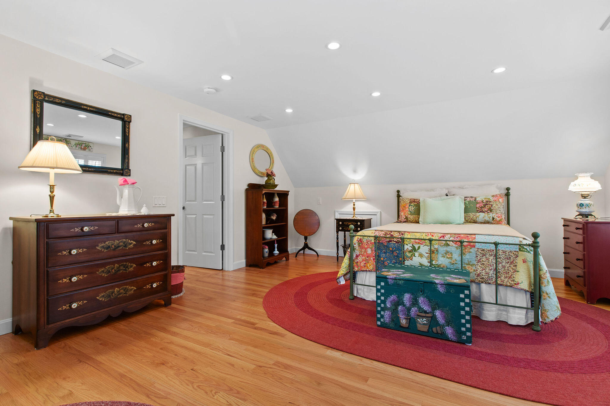 154 Beechtree Drive Brewster, MA 02631 - Photo 63 of 76 a living room with furniture and a wooden floor