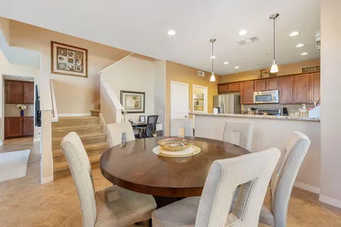 a view of a dining room with furniture