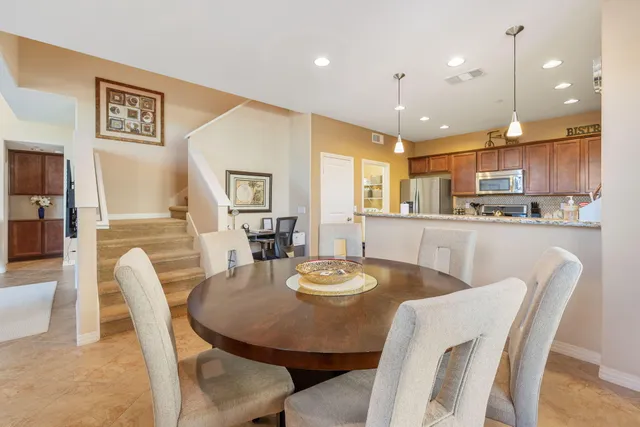 a view of a dining room with furniture