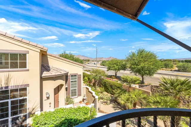 a bathroom with a double vanity sink and mirror