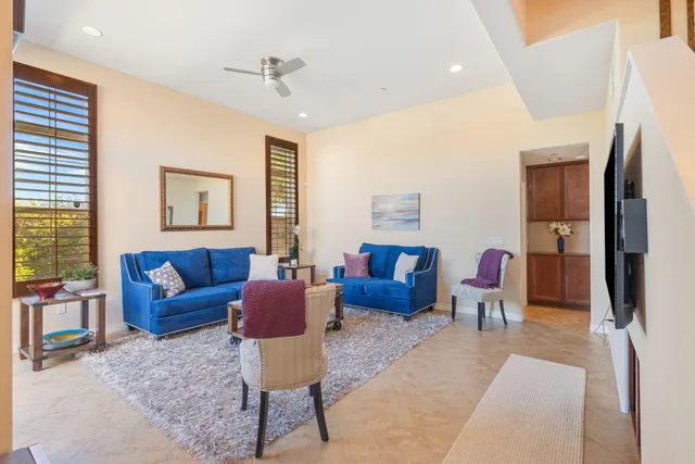 a living room with furniture or couch and a window