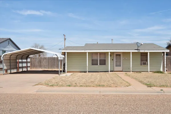 a front view of a house with a garage