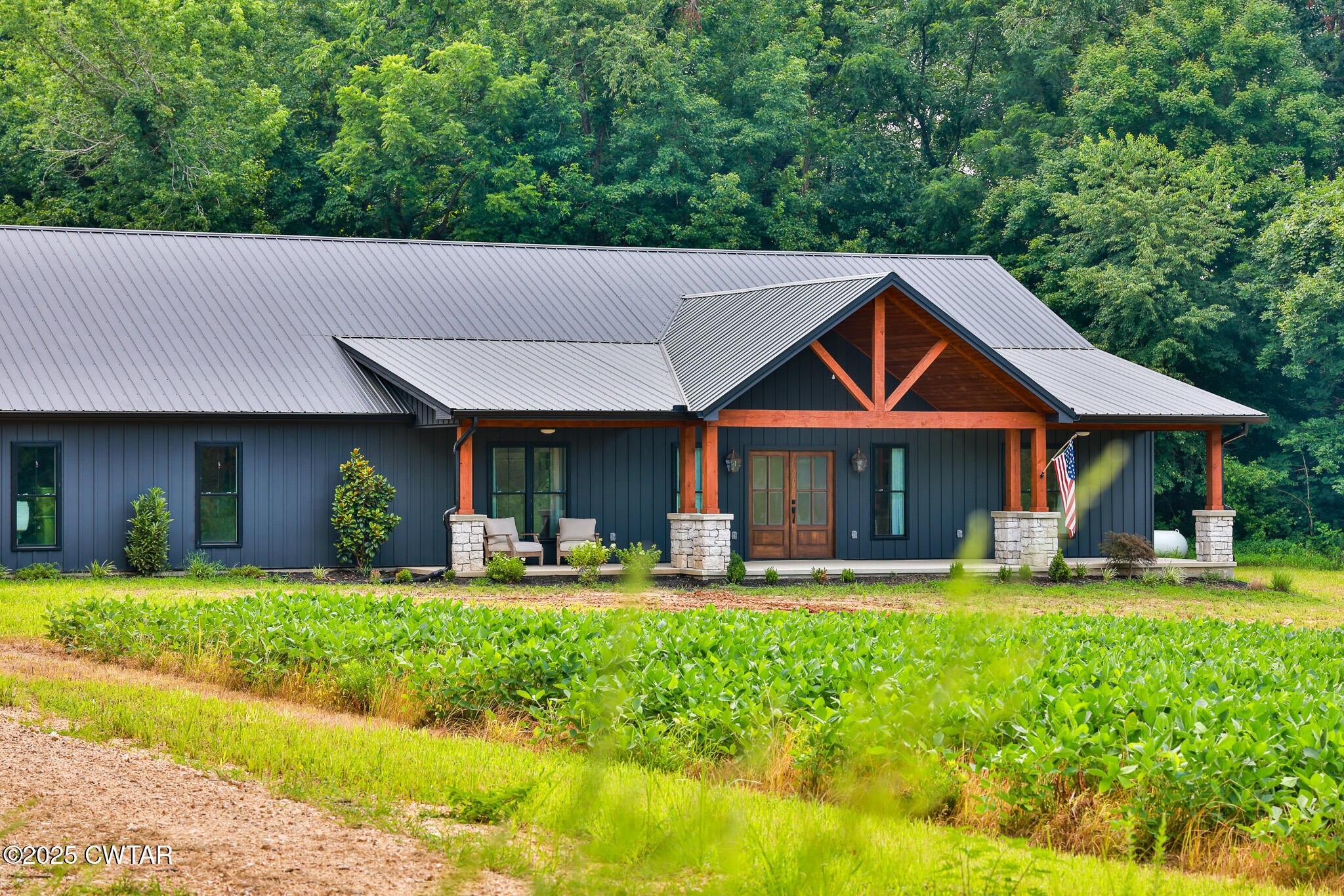 201 Trevathan Road Martin, TN 38237 - Photo 15 of 50 a backyard of a house with yard and outdoor seating