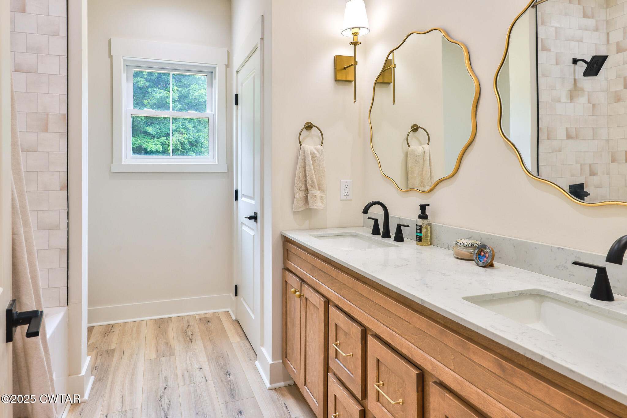 201 Trevathan Road Martin, TN 38237 - Photo 45 of 50 a bathroom with a double vanity sink and a mirror