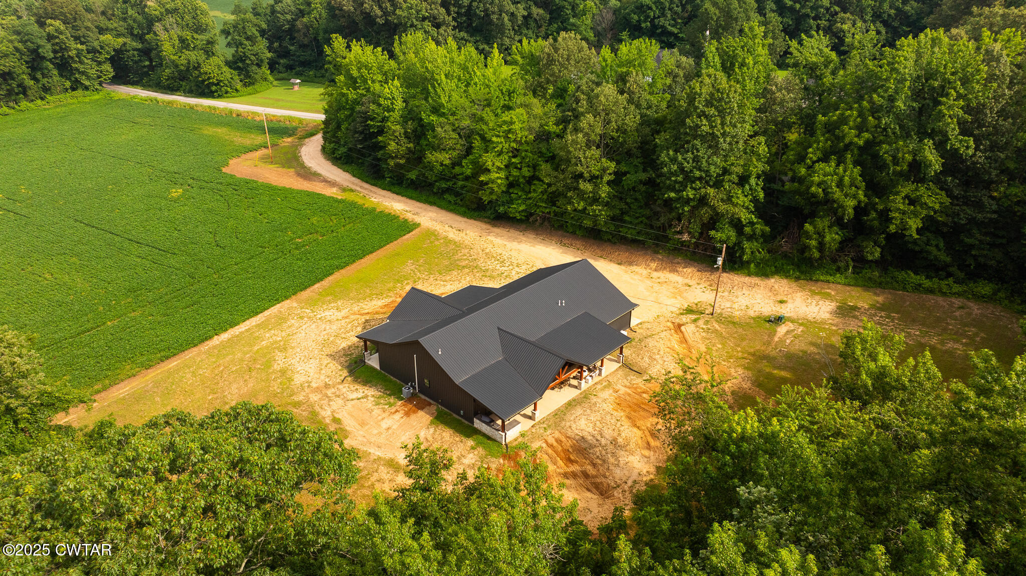 201 Trevathan Road Martin, TN 38237 - Photo 5 of 50 a view of a back yard of the house