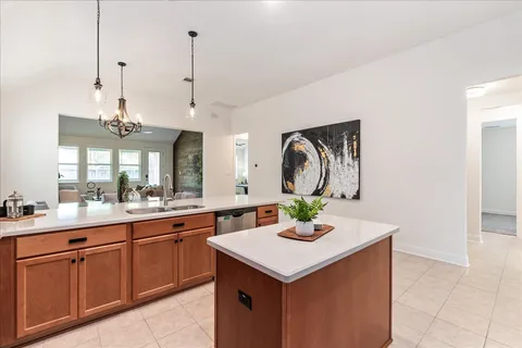 a kitchen with a stove and a microwave