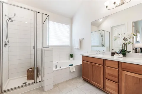 a bedroom with bed and a window