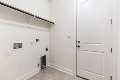 a kitchen with stainless steel appliances a refrigerator and a stove top oven