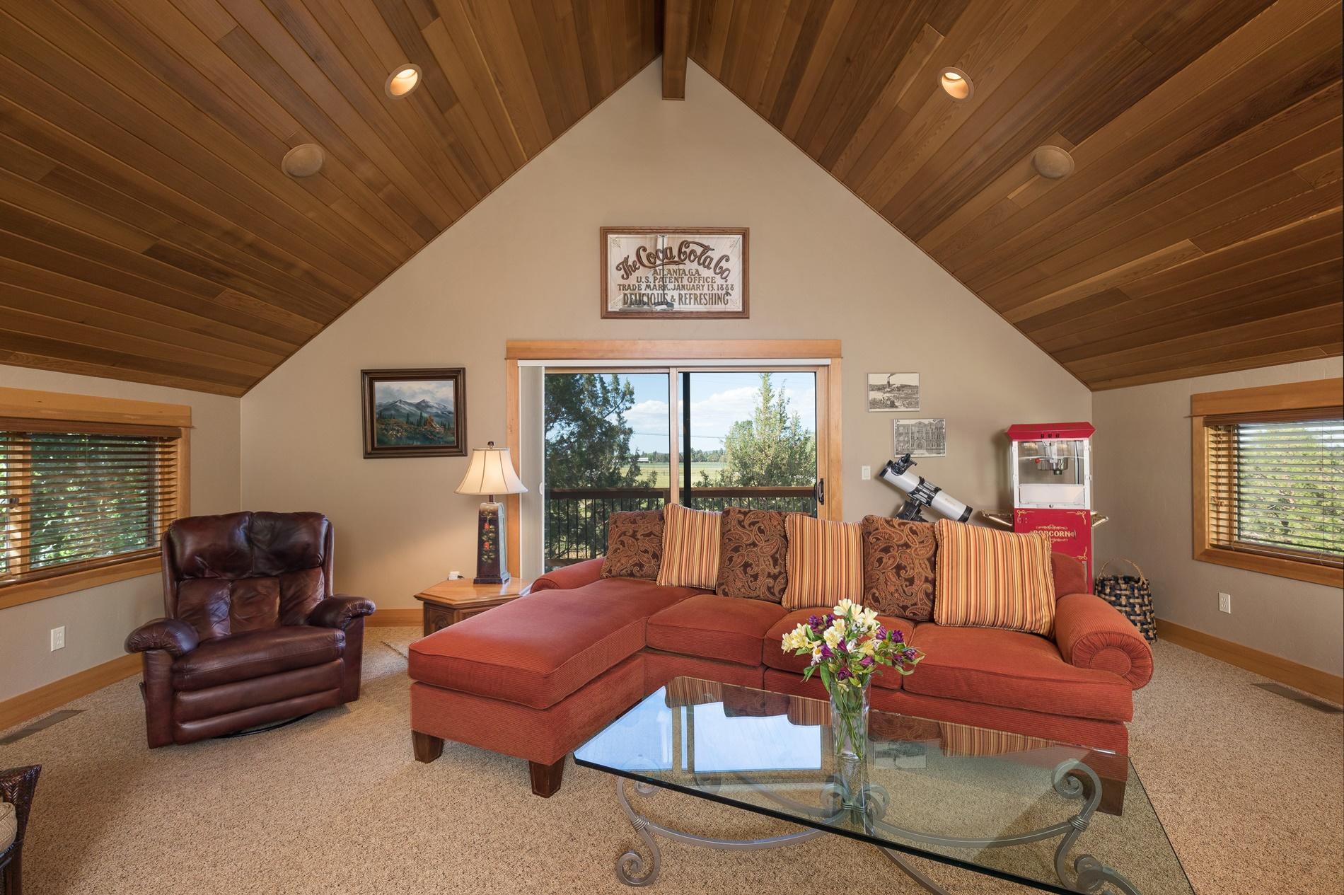 64980 Gerking Market Road Bend, OR 97703 - Photo 23 of 35 Beautiful tongue and groove ceilings and a private balcony looking over farmland completes the space.