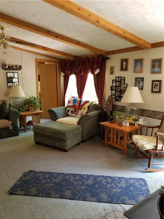17 Forbes Road West Paris, ME 04289 - Photo 5 of 10 Beamed living room.