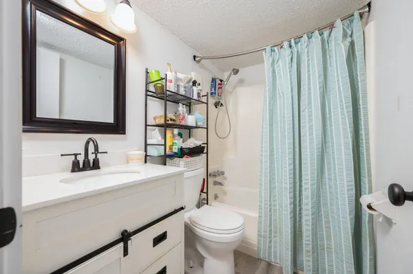 a view of swimming pool from a balcony