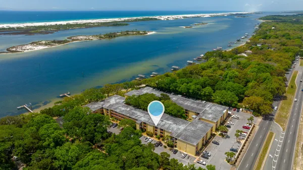 a view of a lake with a yard