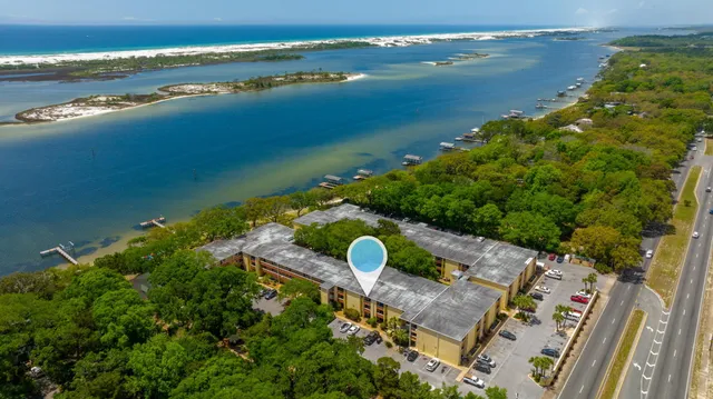 a view of a lake with a yard