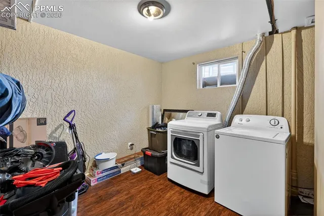a utility room with dryer and washer