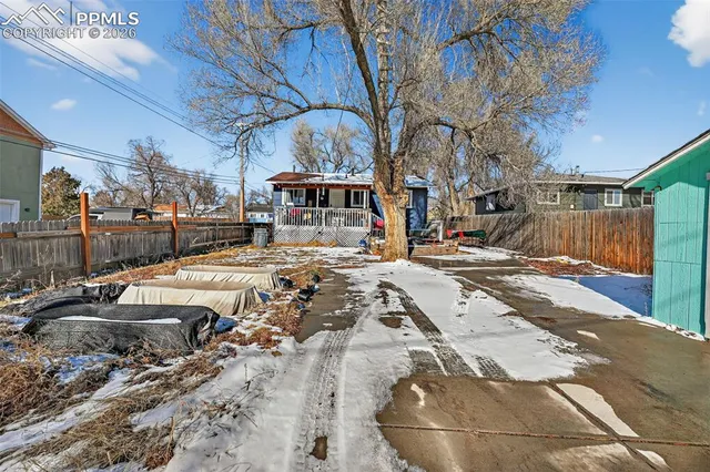 a view of a swimming pool with a patio