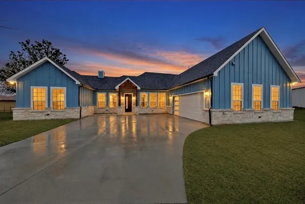 a view of a house with pool and porch