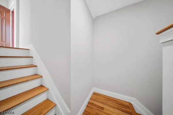a view of a hallway with closet