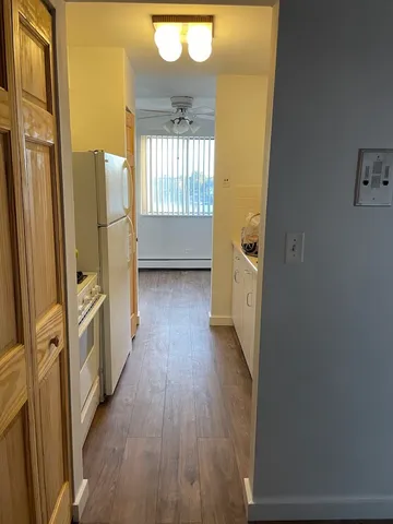 a bathroom with a toilet a sink and shower