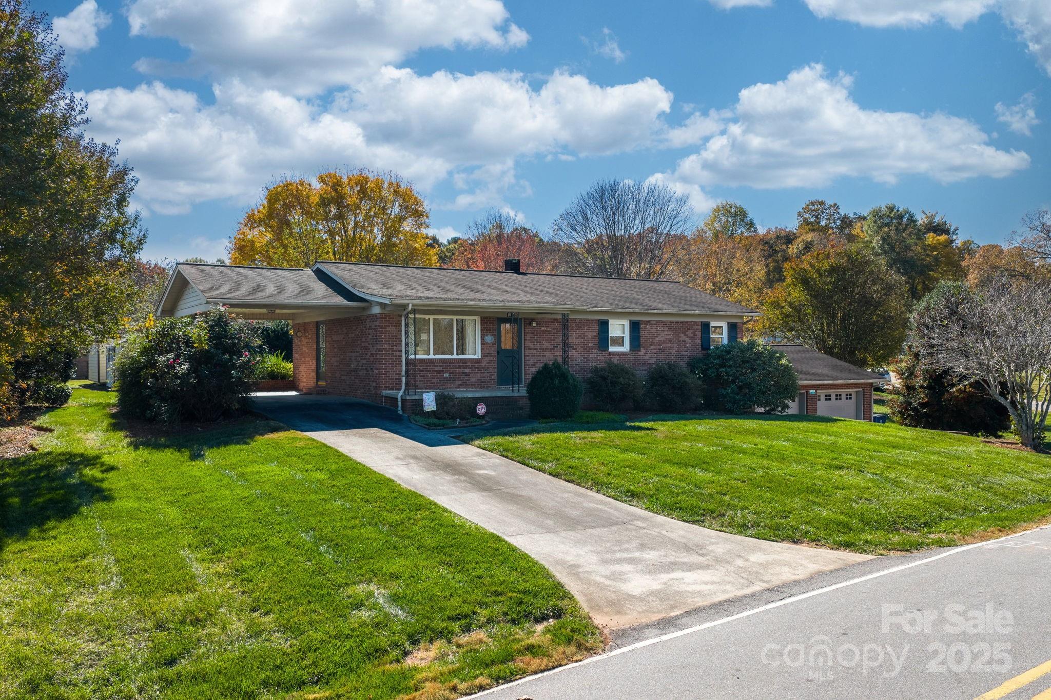 1515 Fairway Acres Road Lenoir, NC 28645 - Photo 17 of 35 a view of a house with a yard