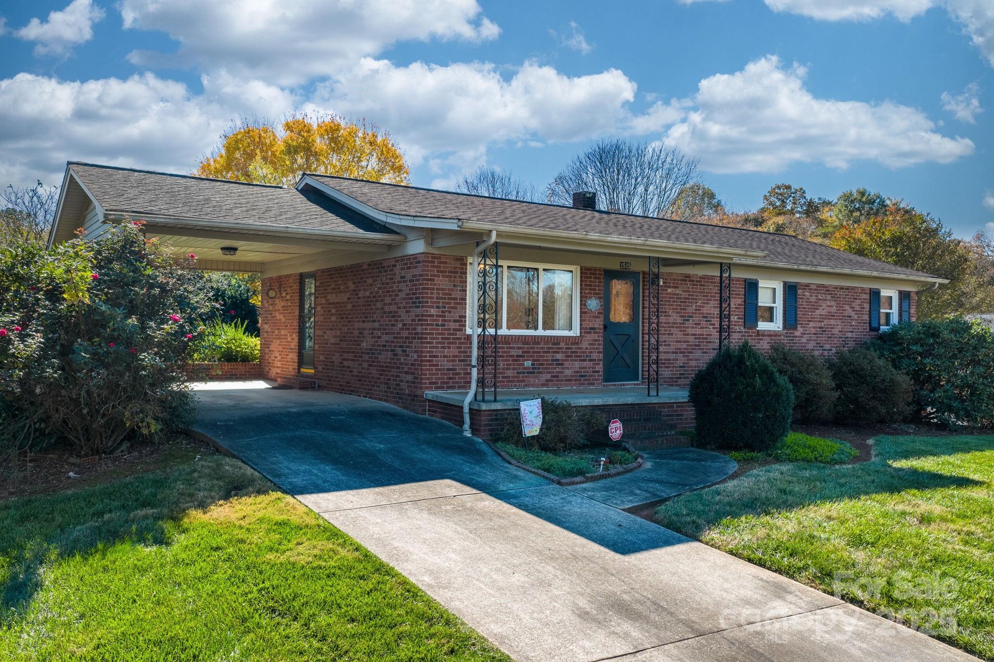 1515 Fairway Acres Road Lenoir, NC 28645 - Photo 18 of 35 a front view of a house with garden